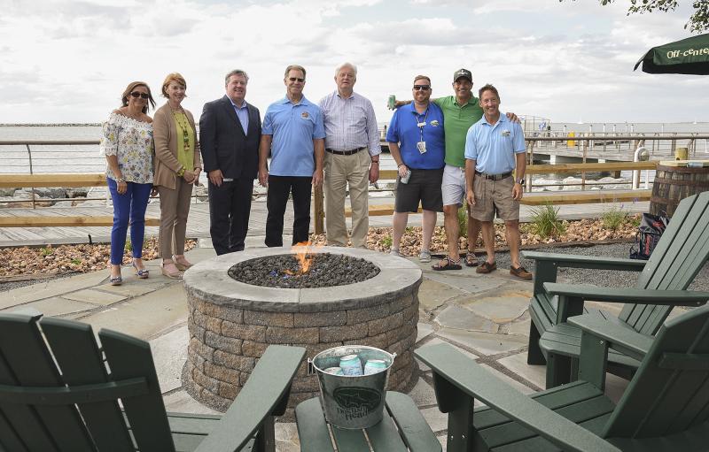 Shown at the opening of Off-centered on the Rocks are (l-r) Nikky Fisher, Rising President Lewes Chamber of Commerce; President Lewes Chamber of Commerce Betsy Reamer; Tom Cook executive director DRBA; Jim Ford, DRBA commissioner; Lewes Mayor Ted Becker; Shaun O’Brien, superintendent of food and retail at CMLF; Sam Calagione, founder of Dogfish Head Craft Brewery; and Heath Gehrke, director of Cape May - Lewes Ferry operations.